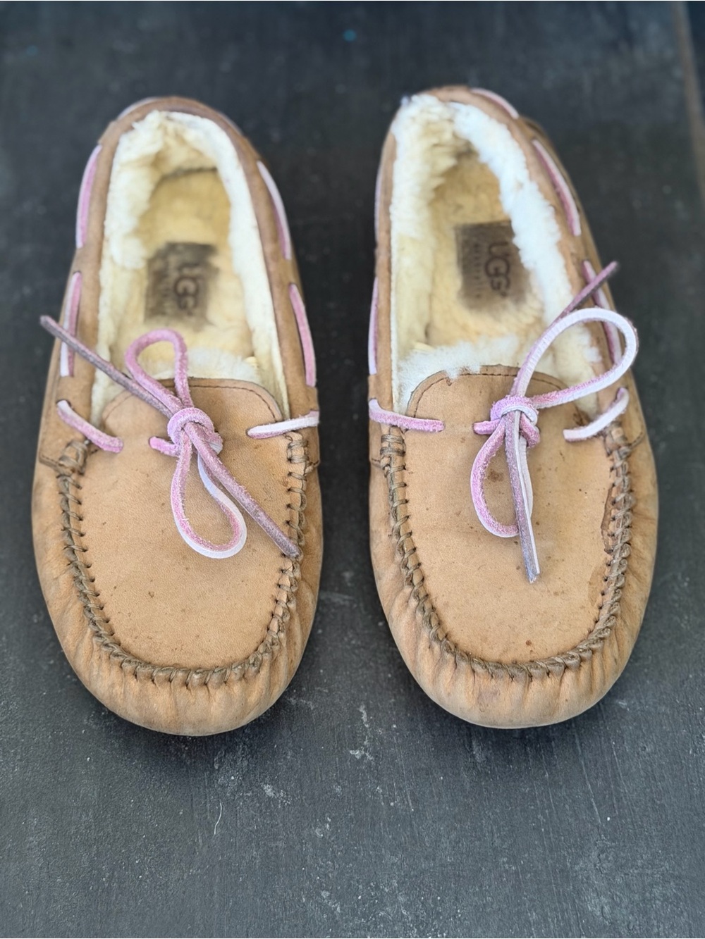 UGG women’s Tan Suede Moccasin Slippers with Pink Laces